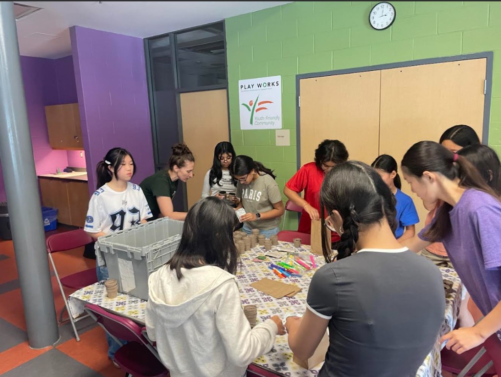 CapitalHER participants collaborating at a community workshop